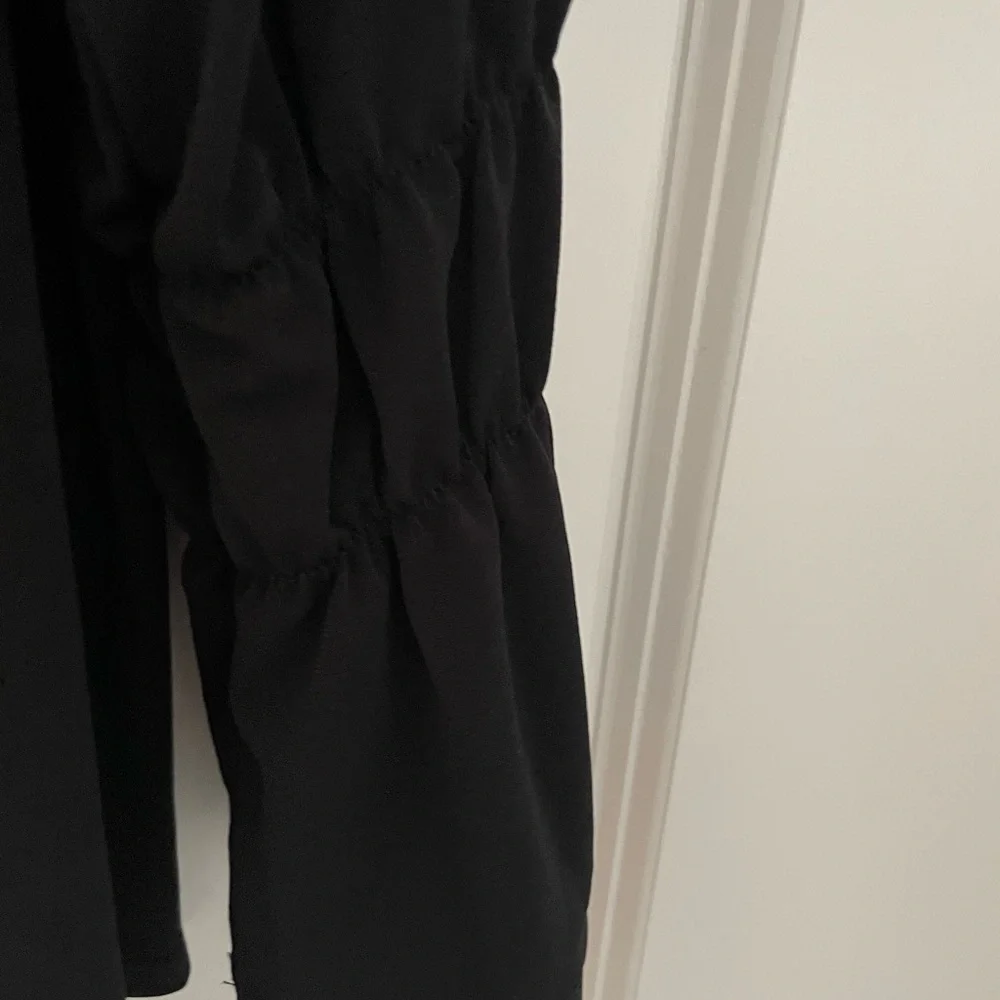 New Chico’s top with details on back and sleeves. - Picture 3 of 6